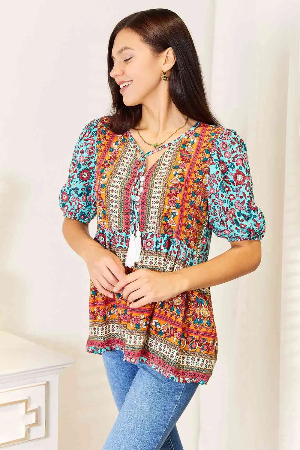 Bohemian Breeze Tassel Tie Puff Sleeve Babydoll Blouse